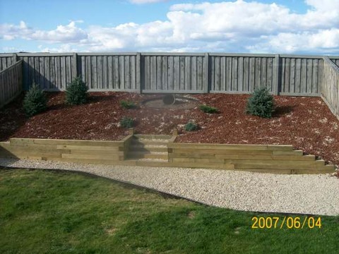 hillside-landscaping-wood-retaining-wall